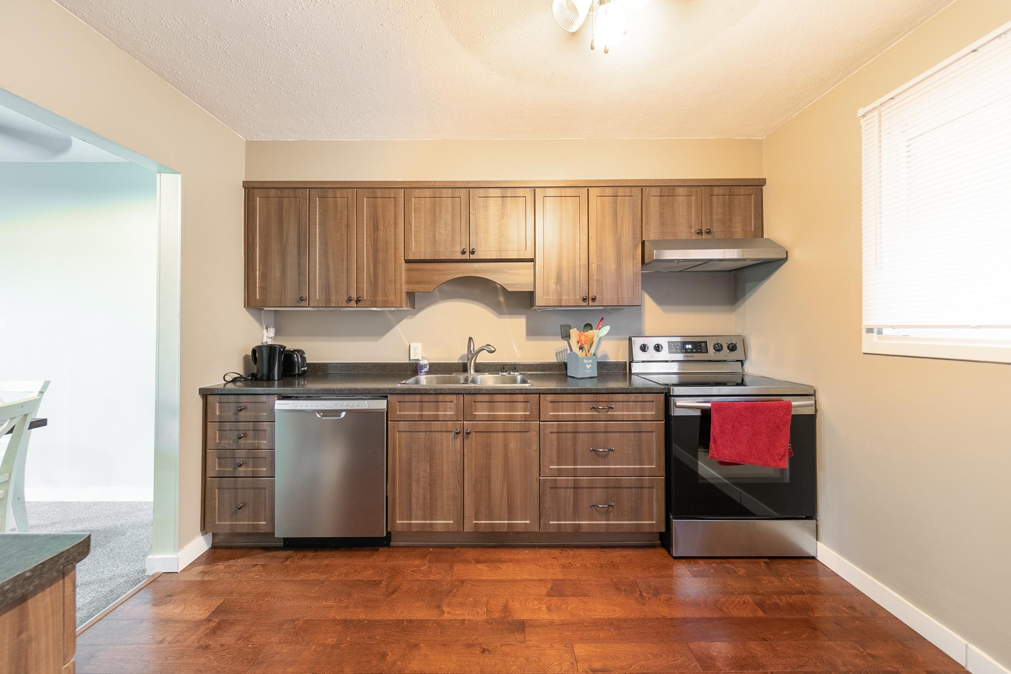 Fully furnished rental suite interior with modern amenities